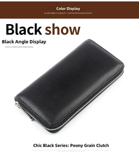 Detailed 45-degree angle of a black pebbled leather long wallet with silver zipper