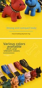 Close-up of colorful cartoon French Bulldog keychains with studded collars and straps
