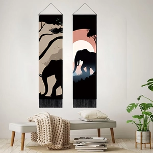 Tapestry featuring black elephant silhouettes with African sunset and elegant fringe decor