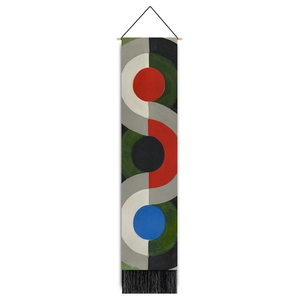 Detail of bohemian geometric woven tapestry with colorful circles and bottom tassels