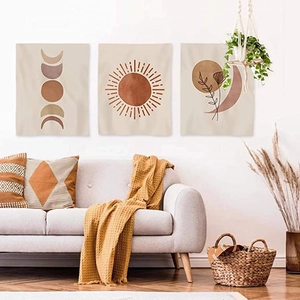 Three-piece bohemian wall art set featuring sun and moon phases in earthy terracotta tones