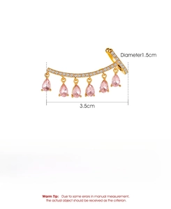 Detail view of golden water-drop tassel ear cuff with pink stones and 3.5cm size markings
