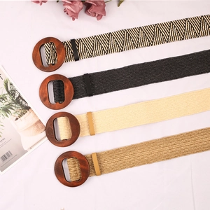 Set of four bohemian woven belts with round wooden buckles in neutral color options