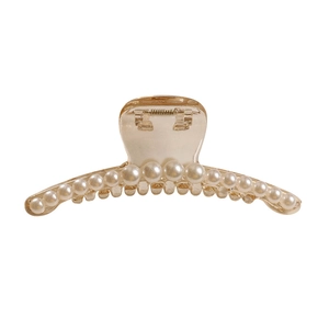 Elegant large transparent pearl hair claw clip for women featuring a minimalist design