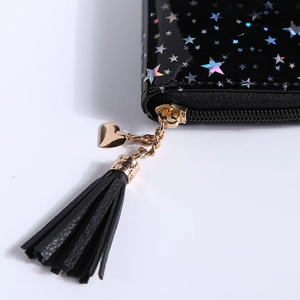 Black holographic star patterned wallet with golden heart pendant and tassel accent