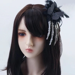 Gothic Halloween skeleton hand hair clip with black rose lace and feather detail