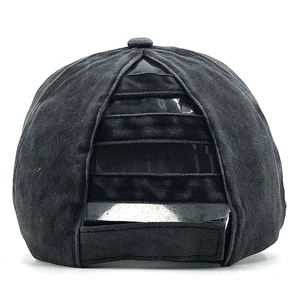 Detail of the multi-layer open back design on a washed cotton ponytail baseball cap