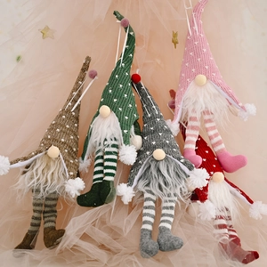 Five assorted Christmas gnome plush ornaments with long legs and LED lights for holiday decor