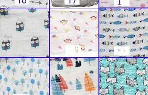Détail de l'assortiment de langes en mousseline de coton avec divers imprimés d'animaux