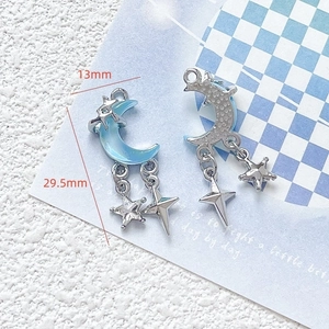 Detail of sea salt blue moon and star pendant charms showing dimensions 29.5mm by 13mm
