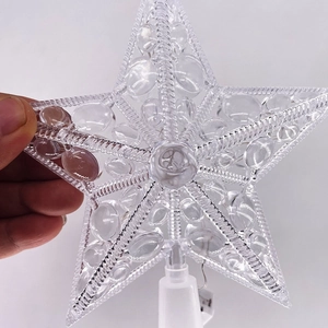 Detail of transparent 15cm pentagram star tree topper with textured bubble pattern