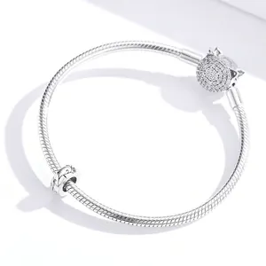925 sterling silver snake chain bracelet featuring a cat head pavé charm and patterned bead