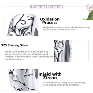 Detailed macro view of S925 sterling silver charm with vintage patterns and 3A zircon stones