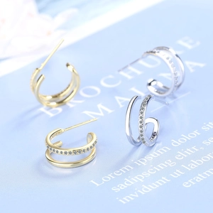 Minimalist double-row C-shaped hoop earrings with sparkling zircon inlay in gold and silver
