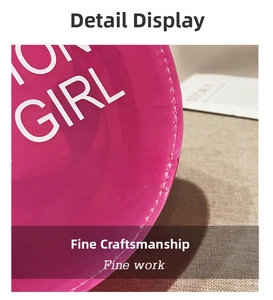 Macro detail of magenta PVC beach bag featuring Fashion Girl print and precision stitching