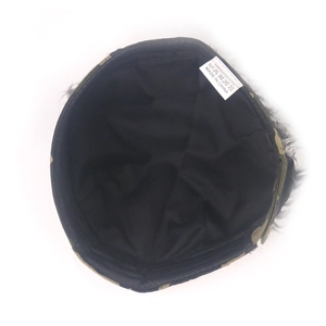 Detail view of cotton inner lining with care label inside the camo skull cap