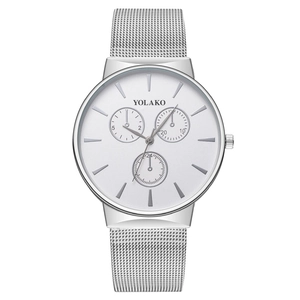 Minimalist silver men's quartz watch with stainless steel mesh band and three-dial design