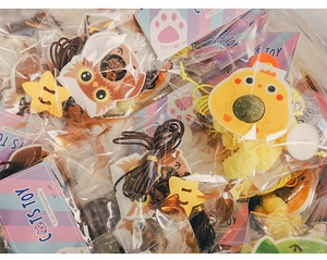 Wholesale bulk pack of colorful plush cat toys with feathers and catnip balls in packaging