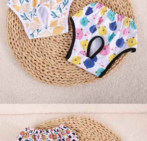 Detail view of printed dog physiological pants featuring elastic waist and tail hole