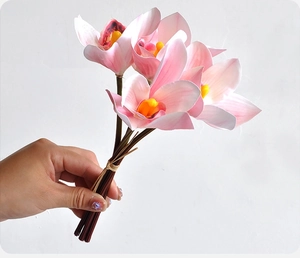 Close-up of realistic 3D printed pink cymbidium orchid bouquet with soft gradient petals