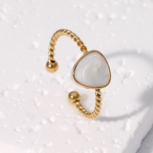 Minimalist gold plated stainless steel twisted ring with a white triangular stone inlay