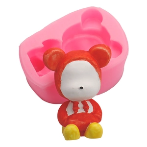 Pink silicone bear mold for DIY cake decoration and fondant with finished teddy bear model