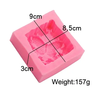 Pink silicone square mold with butterfly and flower relief for DIY soap making