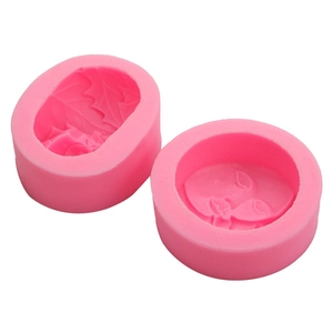 Pink silicone mold set featuring leaf and flower textures for soap and fondant making