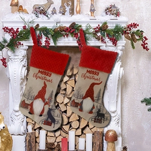 Christmas stockings with gnomes hanging on a decorated fireplace for holiday decor