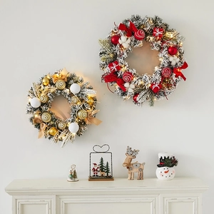 Luminous Christmas wreaths with LED lights in red, gold, and white festive decorations