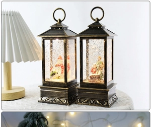 Close-up of vintage bronze Christmas lanterns with snow globe effect and holiday scenes