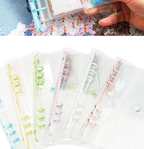 Close-up of colorful binder clips and transparent 5D diamond painting storage bags