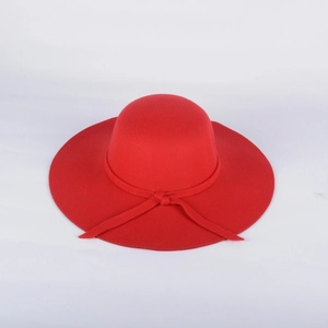 Detailed view of wide brim red wool felt hat with decorative matching bow tie