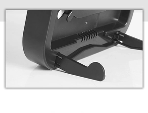Detail of a black foldable plastic stand for LED electronic clocks on white background