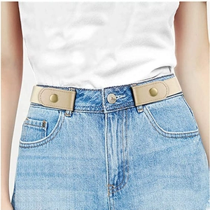 Slim beige buckle-free elastic invisible belt for jeans shown on a model waist