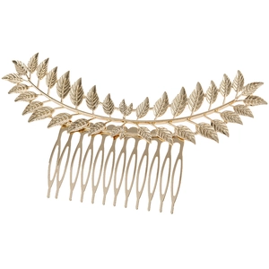 Detailed close-up of golden hollow leaf patterns on a vintage Greek style hair comb