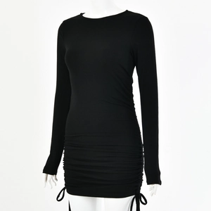 Detail of side drawstring ruching on black long sleeve bodycon mini dress