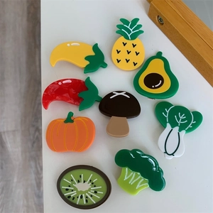 Set of 9 colorful acetate fruit and vegetable hair clips including avocado and broccoli
