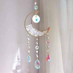 Golden moon crystal suncatcher with evil eye beads and hanging raindrop prisms for windows