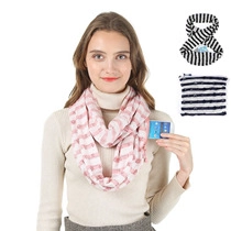 Detail of soft striped infinity scarf featuring a functional hidden zipper pocket for phone