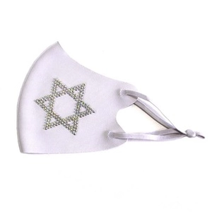 Detail of white cloth mask featuring a sparkling rhinestone Star of David and adjustable straps