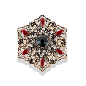 Baroque vintage mandala brooch in antique gold with colorful gemstones and crystals