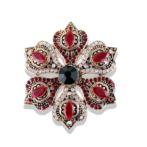 Baroque vintage flower brooch with red marquise stones and black center diamond