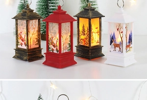 Detail of four colorful Christmas lanterns with LED lights and holiday character prints