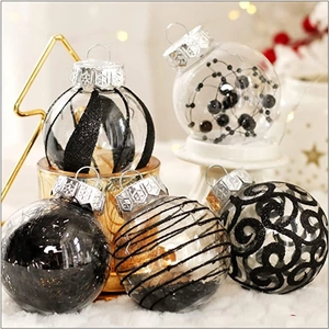 Detail of 6cm PET transparent Christmas balls with black feathers and glitter ornaments