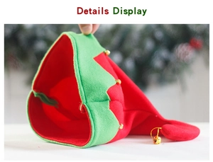 Close-up of red and green Christmas elf hat featuring small golden bells and soft fabric