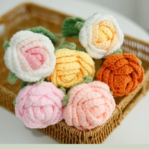 Close-up of handmade crochet rose bouquet in assorted pastel colors for teacher gifts
