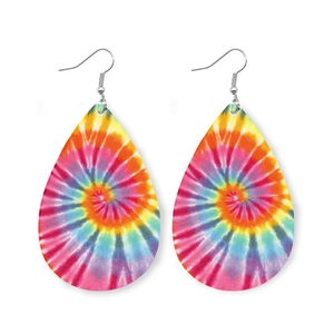 Ethnic teardrop earrings with blue and white porcelain tie-dye pattern on leather base