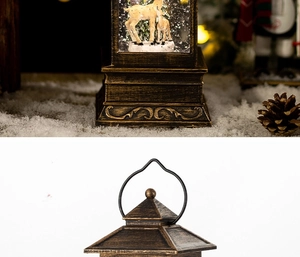 Close-up of vintage bronze Christmas lantern with deer forest scene and snow glitter