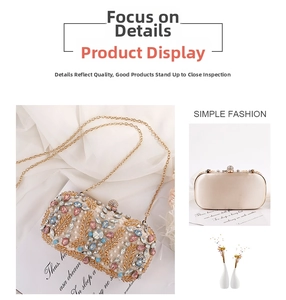 Detail of luxury evening clutch with colorful gemstones, pearls and gold embroidery